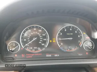 2013 BMW 5 Series 528i xDrive z VIN WBAXH5C58DD108132, wystawiony jako Copart lot #57969865 z przebiegiem 68 308 mil mil oraz Szkoda całkowita • Salvage title. Historia ofert i sprzedaży dostępna na DreamBid. Obrazek 9.