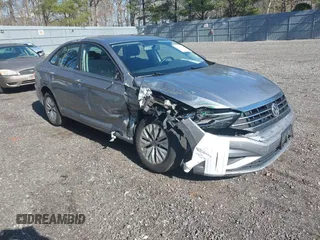 2019 Volkswagen Jetta S z VIN 3VWC57BUXKM242671, wystawiony jako IAAI lot #41813164 z przebiegiem 100 642 mil mil oraz . Historia ofert i sprzedaży dostępna na DreamBid. Obrazek 1.