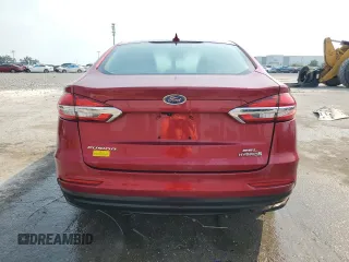 2019 Ford Fusion Hybrid SEL with VIN 3FA6P0MU9KR136851, listed as a Copart auction lot 51752575 with 104,637 mi miles and Salvage Title. Bid and sale history available at carsss.com. Image 6.