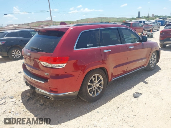 2014 Jeep Grand Cherokee Summit with VIN 1C4RJFJT1EC237358, listed as a IAAI auction lot 42602245 with 106,821 mi miles and . Bid and sale history available at DreamBid. Image 4.
