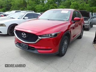 2017 Mazda CX-5 Touring with VIN JM3KFACL2H0197985, listed as a IAAI auction lot 42069182 with 184,734 mi miles. Bid and sale history available at carsss.com. Image 2.