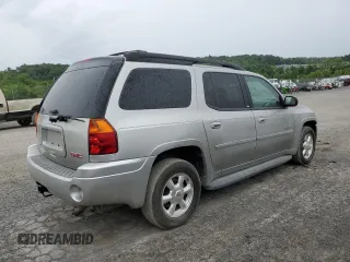2006 GMC Envoy SLE z VIN 1GKET16S566124495, wystawiony jako Copart lot #58792765 z przebiegiem 186 867 mil mil oraz Czysty tytuł • Clean title. Historia ofert i sprzedaży dostępna na DreamBid. Obrazek 3.