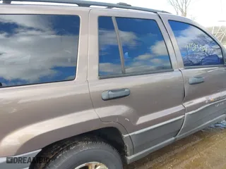 2001 Jeep Grand Cherokee Laredo with VIN 1J4GW48S21C572272, listed as a IAAI auction lot 41695754 with 169,229 mi miles. Bid and sale history available at carsss.com. Image 13.