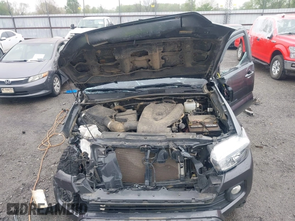 2022 Toyota Tacoma SR with VIN 3TMCZ5AN1NM476353, listed as a IAAI auction lot 41938107 with 51,782 mi miles and . Bid and sale history available at DreamBid. Image 10.