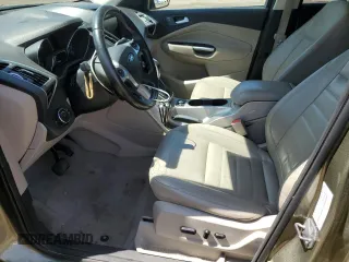 2013 Ford Escape SEL z VIN 1FMCU9H93DUD67848, wystawiony jako Copart lot #57221755 z przebiegiem 129 671 mil mil oraz Czysty tytuł • Clean title. Historia ofert i sprzedaży dostępna na DreamBid. Obrazek 7.