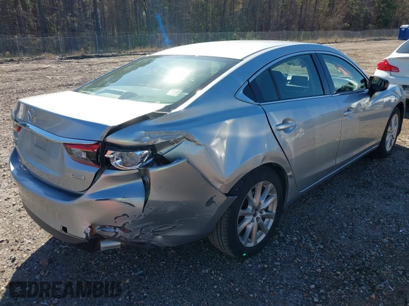 2016 Mazda 6 i Sport with VIN JM1GJ1U50G1412026, listed as a IAAI auction lot 41820838 with 130,262 mi miles and . Bid and sale history available at DreamBid. Image 4.