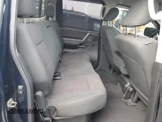 2010 Nissan Titan XE with VIN 1N6AA0EJ8AN313124, listed as a Copart auction lot 82052444 with 160,023 mi miles and Salvage Title. Bid and sale history available at carsss.com. Image 10.