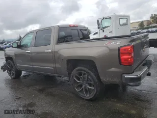 2014 Chevrolet Silverado 1500 LTZ with VIN 3GCUKSEC3EG523333, listed as a Copart auction lot 48069765 with 60,641 mi miles and Salvage Title. Bid and sale history available at carsss.com. Image 2.