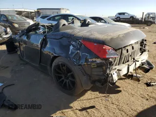 2006 Nissan 350Z Touring z VIN JN1AZ36A36M454050, wystawiony jako Copart lot #77702724 z przebiegiem Nie podano mil oraz Czysty tytuł • Clean title. Historia ofert i sprzedaży dostępna na DreamBid. Obrazek 2.