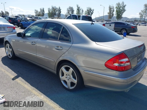 2003 Mercedes-Benz E-Class 3.2L with VIN WDBUF65J63X103423, listed as a IAAI auction lot 41937358 with 151,439 mi miles. Bid and sale history available at carsss.com. Image 3.