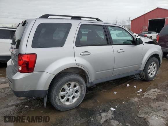 2011 Mazda Tribute Sport with VIN 4F2CY9C70BKM03826, listed as a Copart auction lot 45222665 with 171,082 mi miles and Salvage Title. Bid and sale history available at DreamBid. Image 3.