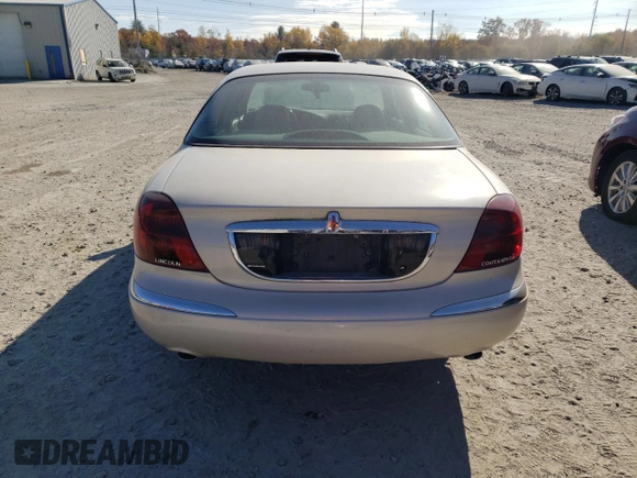 2002 Lincoln Continental with VIN 1LNHM97V62Y699096, listed as a Copart auction lot 77789474 with 106,198 mi miles and Clean Title. Bid and sale history available at carsss.com. Image 6.