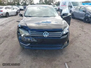 2014 Volkswagen Passat SE w/Sunroof with VIN 1VWBT7A30EC055472, listed as a IAAI auction lot 40975011 with 133,967 mi miles. Bid and sale history available at carsss.com. Image 6.