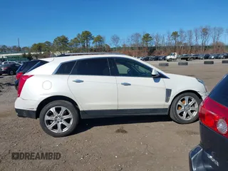 2015 Cadillac SRX Performance Collection with VIN 3GYFNFE35FS573814, listed as a IAAI auction lot 41770696 with 119,205 mi miles and . Bid and sale history available at DreamBid. Image 13.