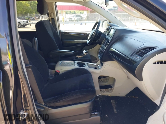 2014 Dodge Grand Caravan SXT with VIN 2C4RDGCG4ER341699, listed as a IAAI auction lot 42064523 with 234,422 mi miles and . Bid and sale history available at DreamBid. Image 5.
