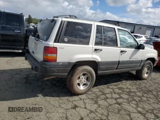 1997 Jeep Grand Cherokee Laredo with VIN 1J4GZ58S8VC647415, listed as a Copart auction lot 49258934 with 0 mi miles and Salvage Title. Bid and sale history available at carsss.com. Image 3.