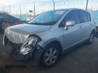 2009 Nissan Versa 1.8 SL with VIN 3N1BC13E29L406619, listed as a IAAI auction lot 41761728 with 115,510 mi miles. Bid and sale history available at carsss.com. Image 2.