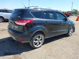 2013 Ford Escape Titanium with VIN 1FMCU0J91DUA51791, listed as a IAAI auction lot 39066929 with 193,451 mi miles. Bid and sale history available at carsss.com. Image 4.