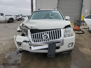 2009 Mercury Mariner Premier with VIN 4M2CU87G79KJ03236, listed as a Copart auction lot 84059324 with 130,335 mi miles and Salvage Title. Bid and sale history available at carsss.com. Image 5.