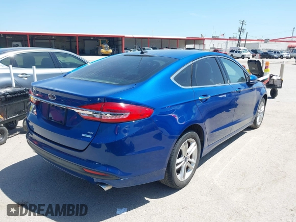 2018 Ford Fusion SE with VIN 3FA6P0HD4JR104172, listed as a IAAI auction lot 41997155 with 154,557 mi miles. Bid and sale history available at carsss.com. Image 4.