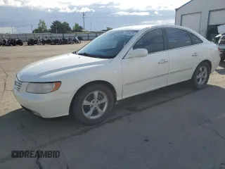 2006 Hyundai Azera SE z VIN KMHFC46F96A072558, wystawiony jako Copart lot #57644625 z przebiegiem 156 743 mil mil oraz Szkoda całkowita • Salvage title. Historia ofert i sprzedaży dostępna na DreamBid. Obrazek 1.