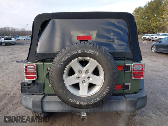 2016 Jeep Wrangler Sport with VIN 1C4AJWAG7GL330159, listed as a IAAI auction lot 41530415 with 98,554 mi miles and . Bid and sale history available at carsss.com. Image 16.