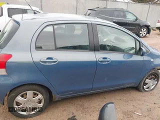 2009 Toyota Yaris with VIN JTDKT903195255240, listed as a IAAI auction lot 41650800 with 168,991 mi miles. Bid and sale history available at carsss.com. Image 13.