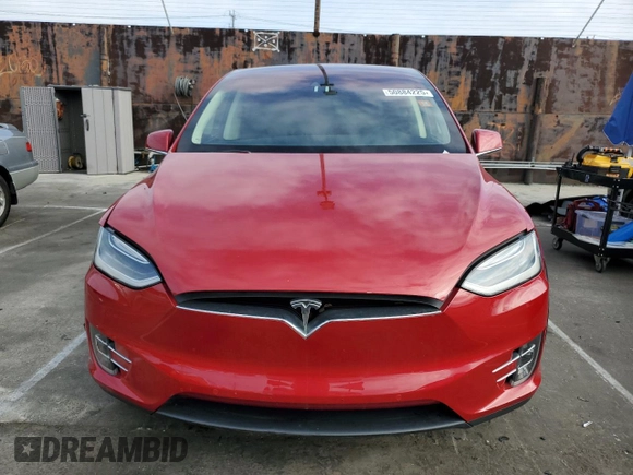 2016 Tesla Model X 70D with VIN 5YJXCAE28GF002399, listed as a Copart auction lot 50884225 with 73,113 mi miles and Salvage Title. Bid and sale history available at DreamBid. Image 5.