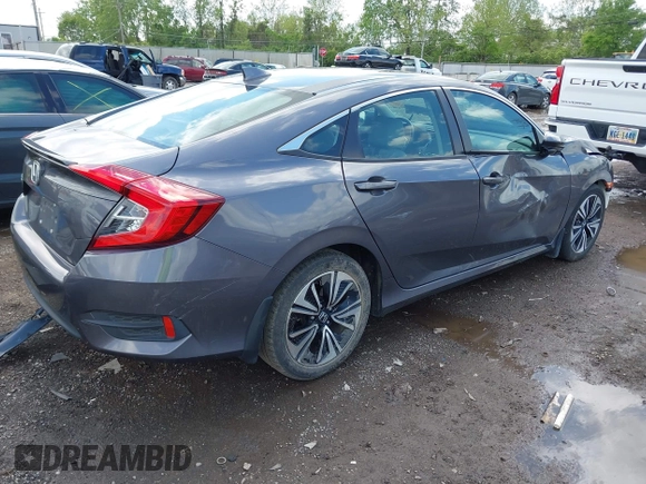 2018 Honda Civic EX-T z VIN 2HGFC1F34JH643975, wystawiony jako IAAI lot #42209799 z przebiegiem 58 684 mil mil oraz . Historia ofert i sprzedaży dostępna na DreamBid. Obrazek 4.