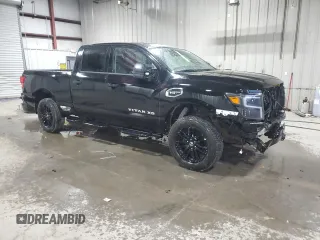 2023 Nissan Titan XD PRO-4X with VIN 1N6AA1FB4PN109300, listed as a Copart auction lot 82003064 with 15,897 mi miles and Salvage Title. Bid and sale history available at carsss.com. Image 4.