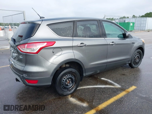 2014 Ford Escape SE with VIN 1FMCU9GX1EUD05513, listed as a IAAI auction lot 42651209 with 110,166 mi miles and . Bid and sale history available at DreamBid. Image 4.