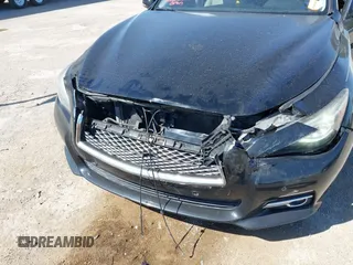 2014 Infiniti Q50 Premium z VIN JN1BV7AP2EM672661, wystawiony jako IAAI lot #42319325 z przebiegiem 85 803 mil mil oraz . Historia ofert i sprzedaży dostępna na DreamBid. Obrazek 6.