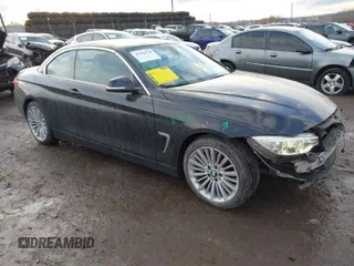 2014 BMW 4 Series 428i with VIN WBA3V7C58EJ872505, listed as a IAAI auction lot 41582928 with 97,274 mi miles and . Bid and sale history available at DreamBid. Image 1.