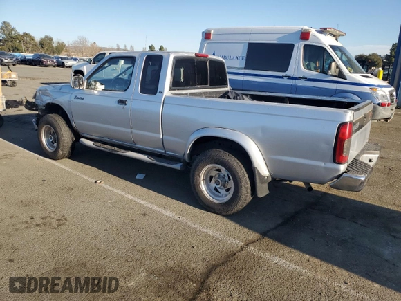 2000 Nissan Frontier XE with VIN 1N6ED26T1YC327635, listed as a Copart auction lot 43149525 with 922,578 mi miles and Salvage title. Bid and sale history available at DreamBid. Image 2.