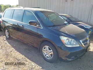 2007 Honda Odyssey EX-L with VIN 5FNRL387X7B030071, listed as a IAAI auction lot 42097074 with 231,624 mi miles. Bid and sale history available at carsss.com. Image 1.