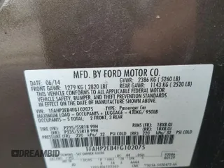2015 Ford Taurus SEL z VIN 1FAHP2E84FG102075, wystawiony jako Copart lot #59740265 z przebiegiem 90 669 mil mil oraz Szkoda całkowita • Salvage title. Historia ofert i sprzedaży dostępna na DreamBid. Obrazek 12.