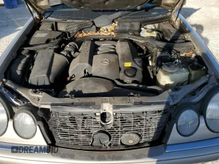1998 Mercedes-Benz E-Class with VIN WDBJH65F9WA597132, listed as a Copart auction lot 77780094 with 0 mi miles and Salvage Title. Bid and sale history available at carsss.com. Image 12.