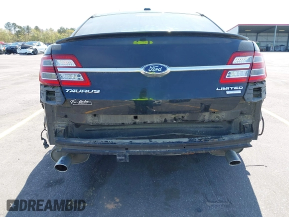 2015 Ford Taurus Limited with VIN 1FAHP2J81FG134973, listed as a IAAI auction lot 41845384 with 139,203 mi miles. Bid and sale history available at carsss.com. Image 6.