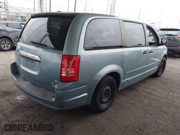 2008 Chrysler Town & Country LX with VIN 2A8HR44H38R831695, listed as a IAAI auction lot 42096656 with 254,424 mi miles and . Bid and sale history available at carsss.com. Image 4.