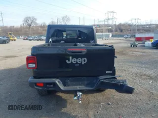 2021 Jeep Gladiator Overland z VIN 1C6HJTFG1ML606215, wystawiony jako IAAI lot #41771646 z przebiegiem 77 411 mil mil oraz . Historia ofert i sprzedaży dostępna na DreamBid. Obrazek 16.