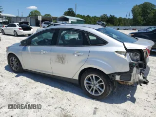 2017 Ford Focus SE with VIN 1FADP3F27HL223918, listed as a Copart auction lot 57464685 with 134,253 mi miles and Salvage title. Bid and sale history available at DreamBid. Image 2.