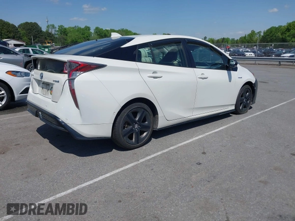 2017 Toyota Prius Two with VIN JTDKARFU4H3051645, listed as a IAAI auction lot 41991804 with 301,338 mi miles. Bid and sale history available at carsss.com. Image 4.