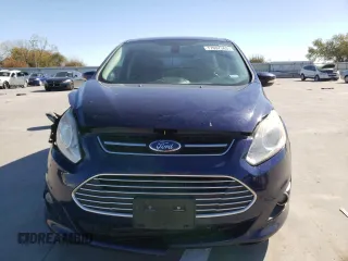 2016 Ford C-Max Energi SEL with VIN 1FADP5CU8GL114965, listed as a Copart auction lot 77697363 with 87,085 mi miles. Bid and sale history available at carsss.com. Image 5.