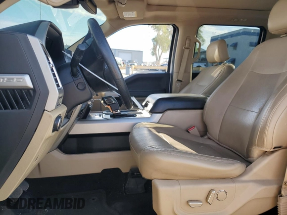 2015 Ford F-150 XLT with VIN 1FTEW1EG7FFA39691, listed as a Copart auction lot 65788854 with 173,025 mi miles and Salvage Title. Bid and sale history available at carsss.com. Image 7.