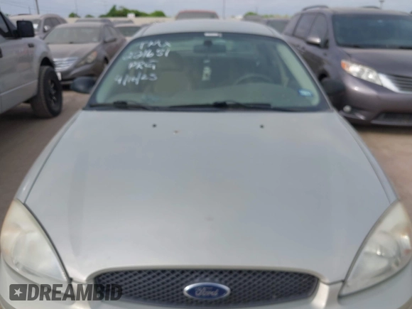 2006 Ford Taurus SE with VIN 1FAFP53U16A221651, listed as a IAAI auction lot 42065261 with 159,411 mi miles. Bid and sale history available at carsss.com. Image 10.