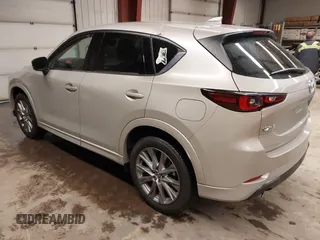 2024 Mazda CX-5 2.5 S Premium Package with VIN JM3KFBDL2R0431998, listed as a IAAI auction lot 41690216 with 14,037 mi miles. Bid and sale history available at carsss.com. Image 3.