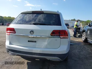 2018 Volkswagen Atlas SE with VIN 1V2CR2CAXJC548220, listed as a IAAI auction lot 41983957 with 118,371 mi miles and . Bid and sale history available at DreamBid. Image 16.