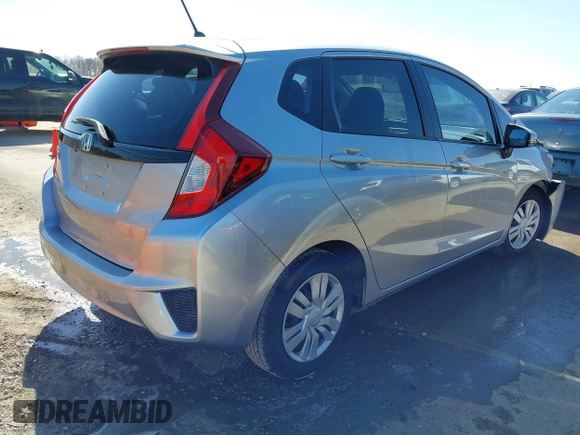 2017 Honda Fit LX with VIN JHMGK5H59HS011308, listed as a IAAI auction lot 41766682 with 88,582 mi miles. Bid and sale history available at carsss.com. Image 4.
