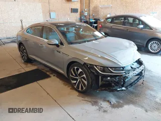 2022 Volkswagen Arteon SEL R-Line z VIN WVWAR7AN9NE009528, wystawiony jako IAAI lot #41510356 z przebiegiem 35 359 mil mil oraz . Historia ofert i sprzedaży dostępna na DreamBid. Obrazek 1.