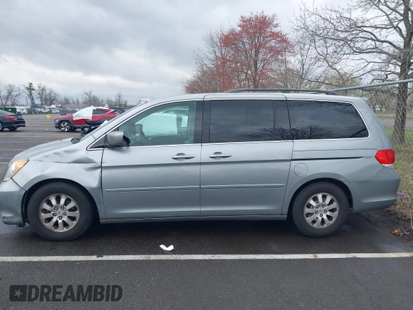 2008 Honda Odyssey EX-L with VIN 5FNRL38718B115950, listed as a IAAI auction lot 41957715 with 226,033 mi miles and . Bid and sale history available at DreamBid. Image 14.